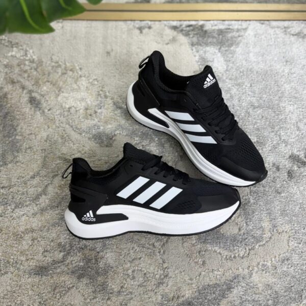54399508-27f1-4777-95e6-1ca1e6b3bd71.jpg ADIDAS BOUNCE2 NEGRA BLANCA