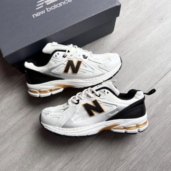 NEW BALANCE 1906X BLANCA NARANJA